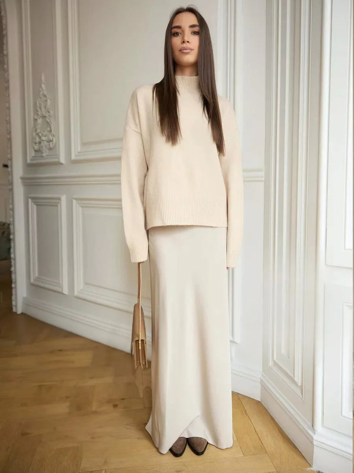 Flattering high-waist long skirt with a dramatic fishtail hem for evening.