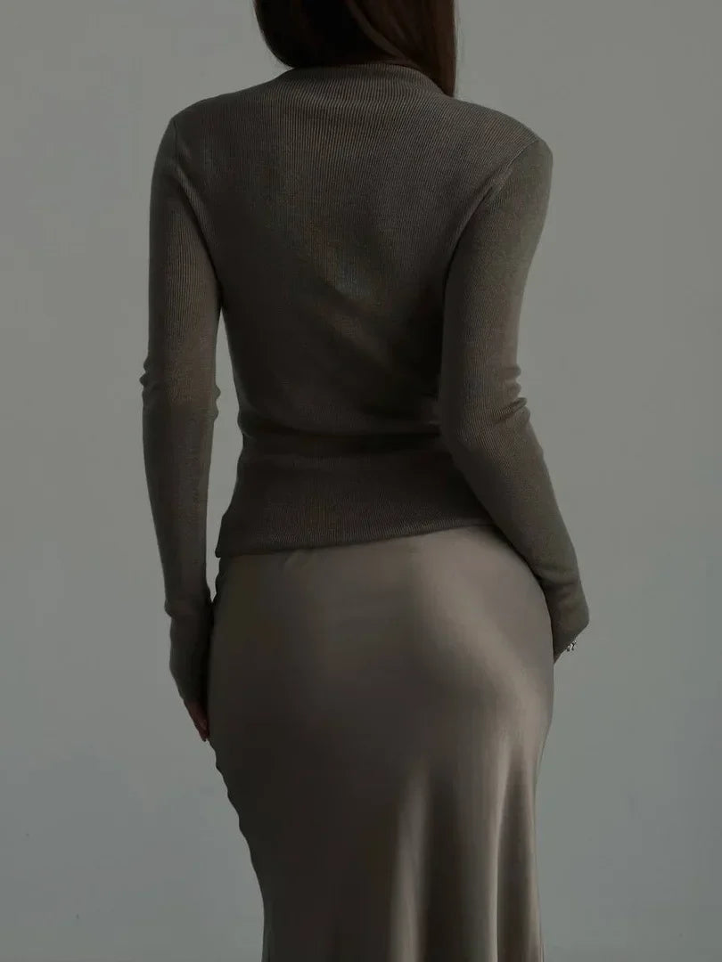 Draped high-waist fishtail long skirt, creating an elegant silhouette for evenings.