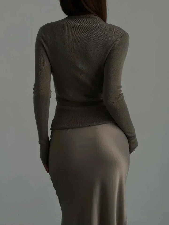Draped high-waist fishtail long skirt, creating an elegant silhouette for evenings.