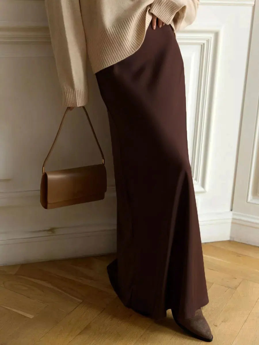 Women's elegant evening maxi skirt, high-waisted with a flowing fishtail cut.