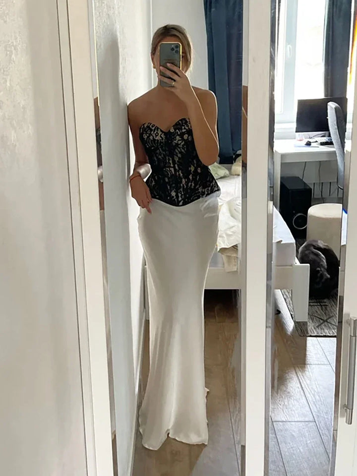 Flowing elegant maxi skirt, high-waisted fishtail design for formal events.