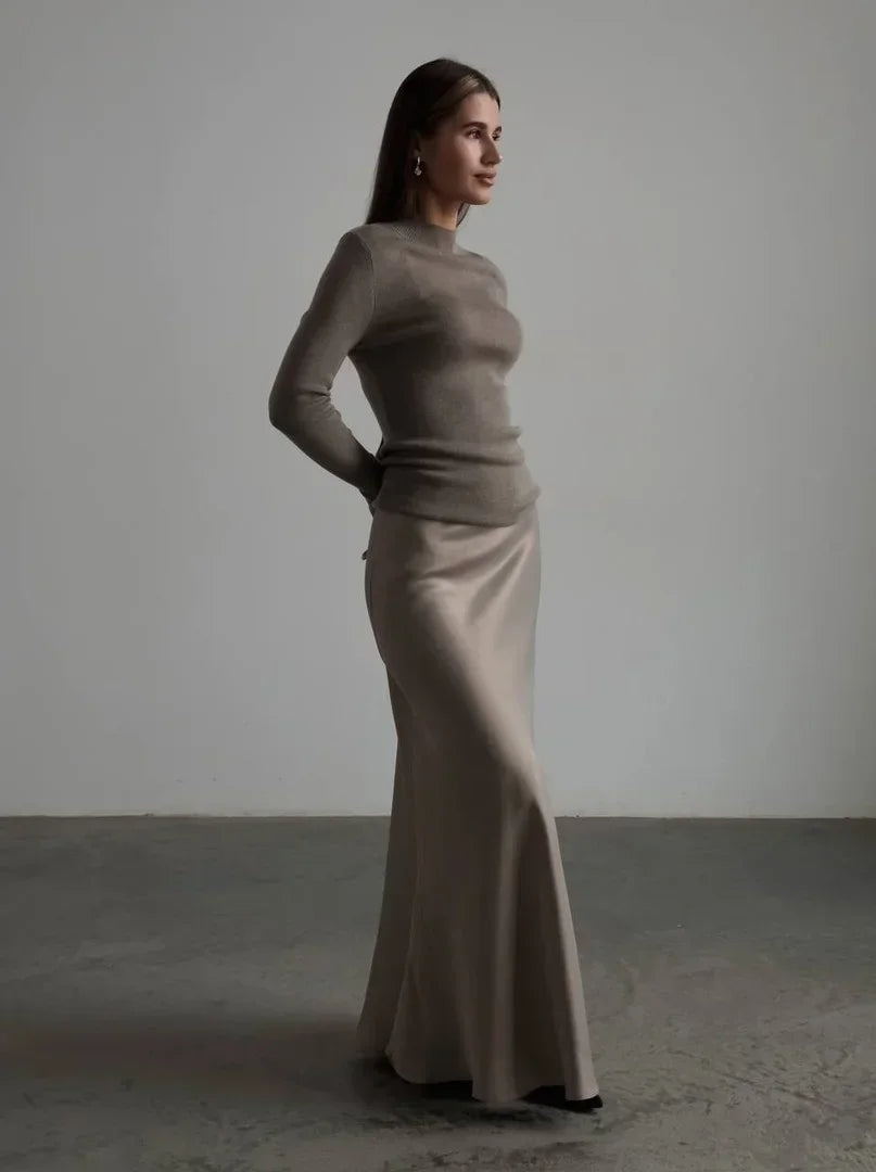 Elegant minimalist high-waist fishtail long skirt, perfect for formal evening wear.