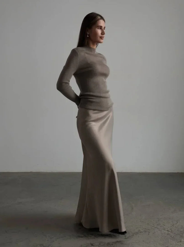 Elegant minimalist high-waist fishtail long skirt, perfect for formal evening wear.