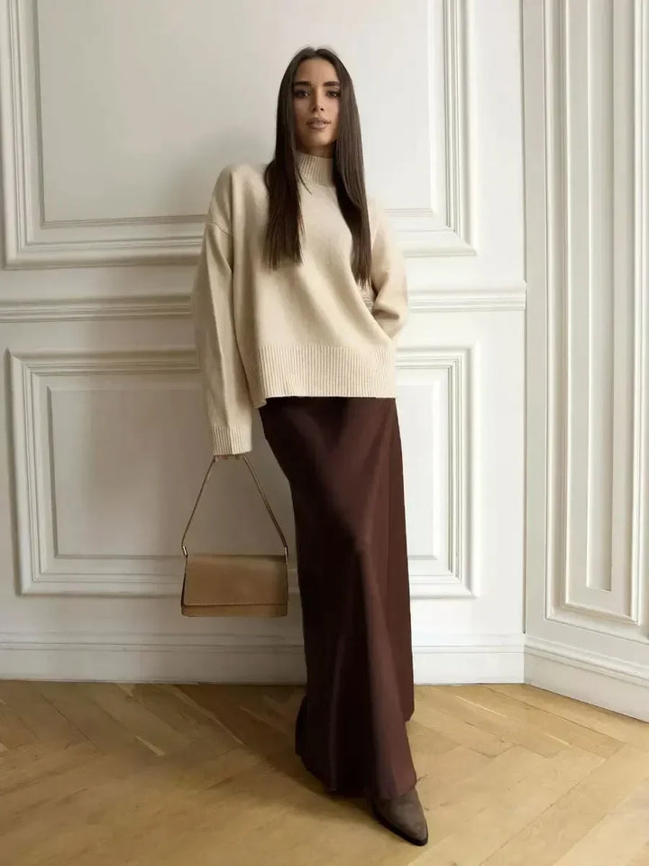 Women's elegant high-waist fishtail maxi skirt, flowing for an evening out.