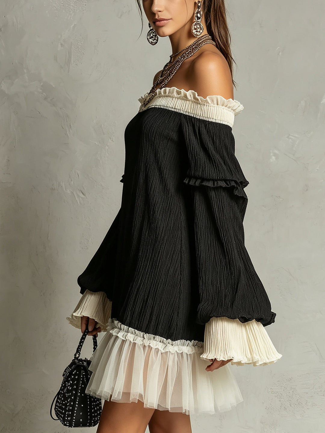 Chic women's black off-shoulder mini dress with delicate lace trim & flirty ruffle sleeves. Stylish evening party wear.