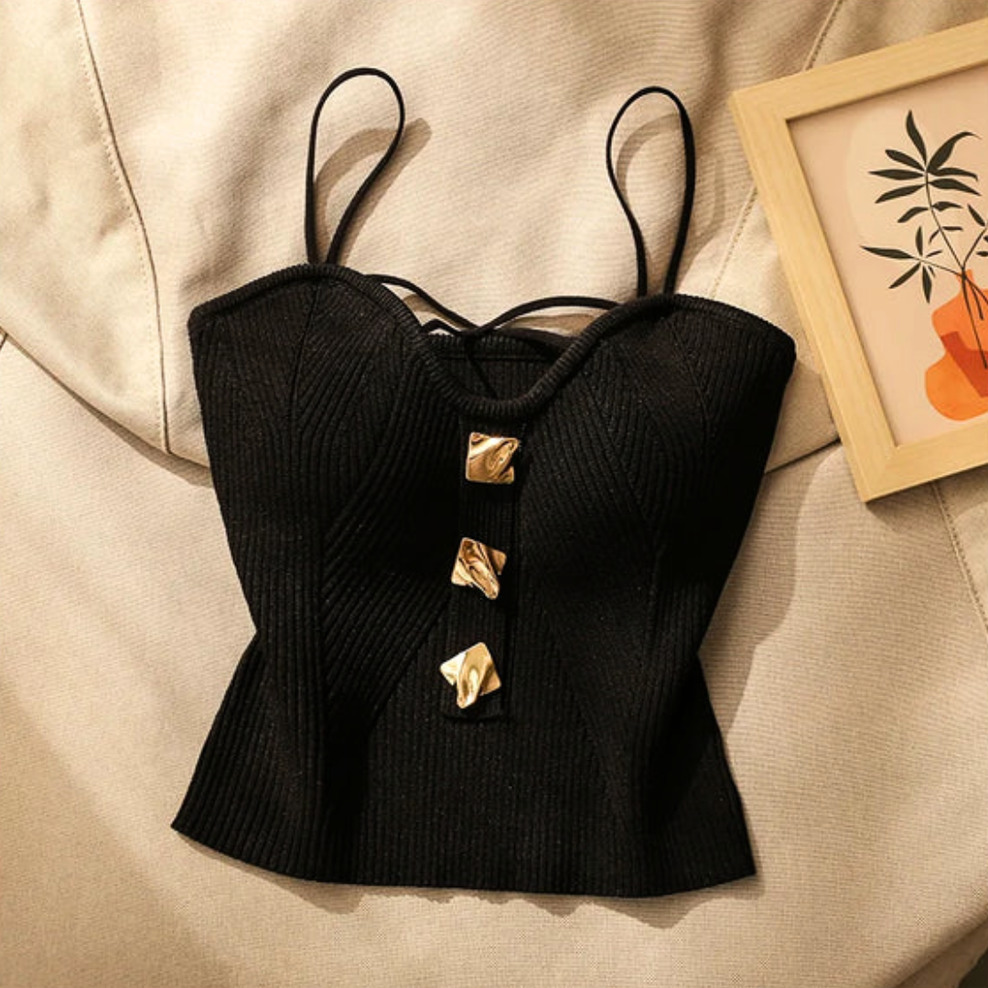 Versatile white women's corset top with adjustable spaghetti straps, perfect for elegant and modern outfits.