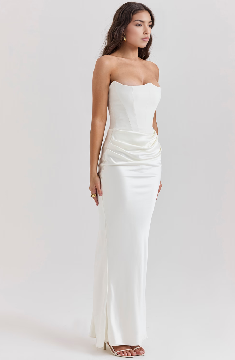Elegant women's strapless maxi dress with corset detail, ideal for evening parties.