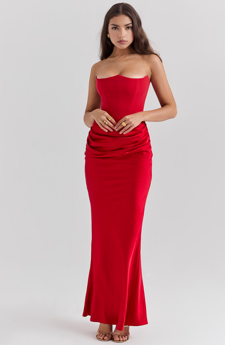 Graceful strapless corset maxi dress for wedding guests, a stunning formal evening gown.