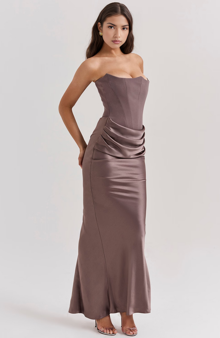 Long strapless formal dress with corset waist, elegant maxi gown for special occasions.