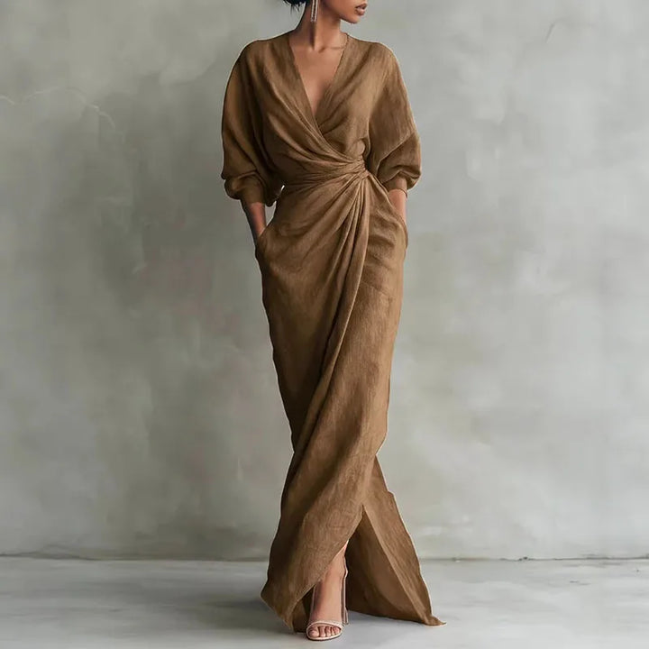 Elegant brown V-neck wrap maxi dress for women. Long sleeve bodycon style, perfect for sophisticated day to night.