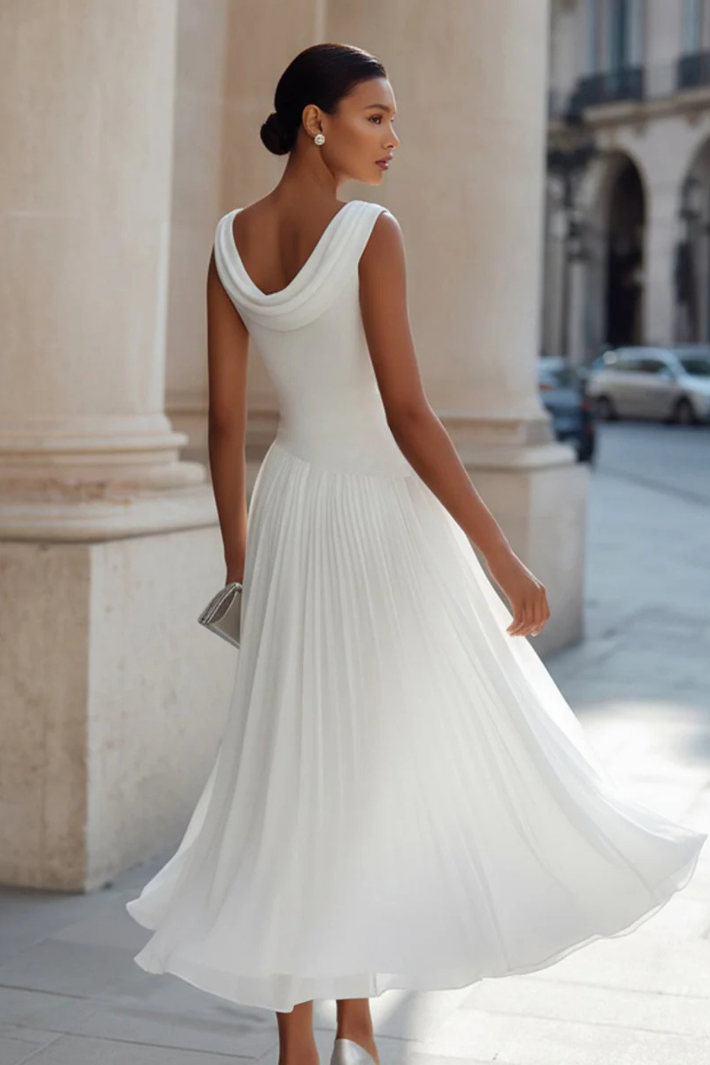 A-line midi dress for women, sleeveless, flowing & elegant, suitable for summer, vacation, or special occasions.
