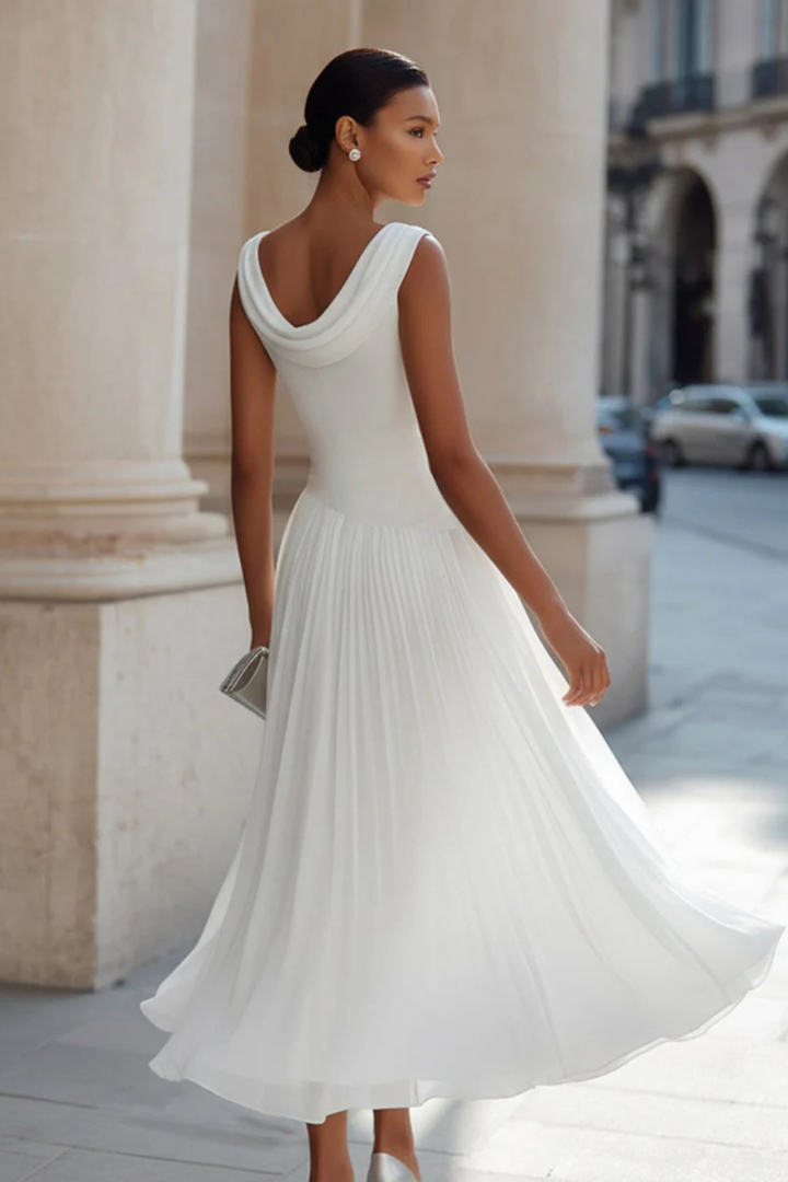 A-line midi dress for women, sleeveless, flowing & elegant, suitable for summer, vacation, or special occasions.