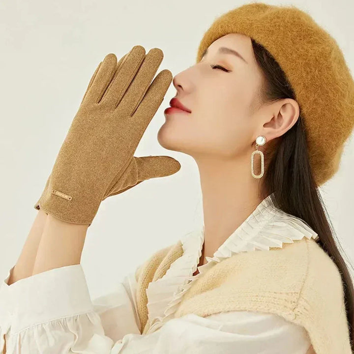 Pink women's fashion gloves, elegant and warm with touchscreen feature.