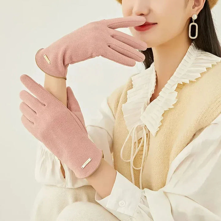 Stylish black women's touchscreen winter gloves, a versatile cold weather accessory.