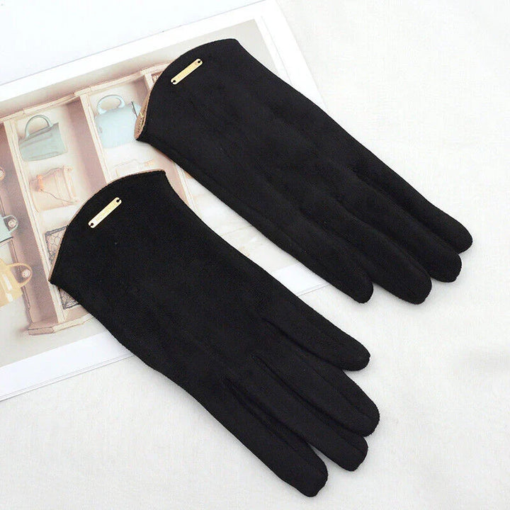 Stylish beige women's touchscreen gloves, essential for cold weather fashion.
