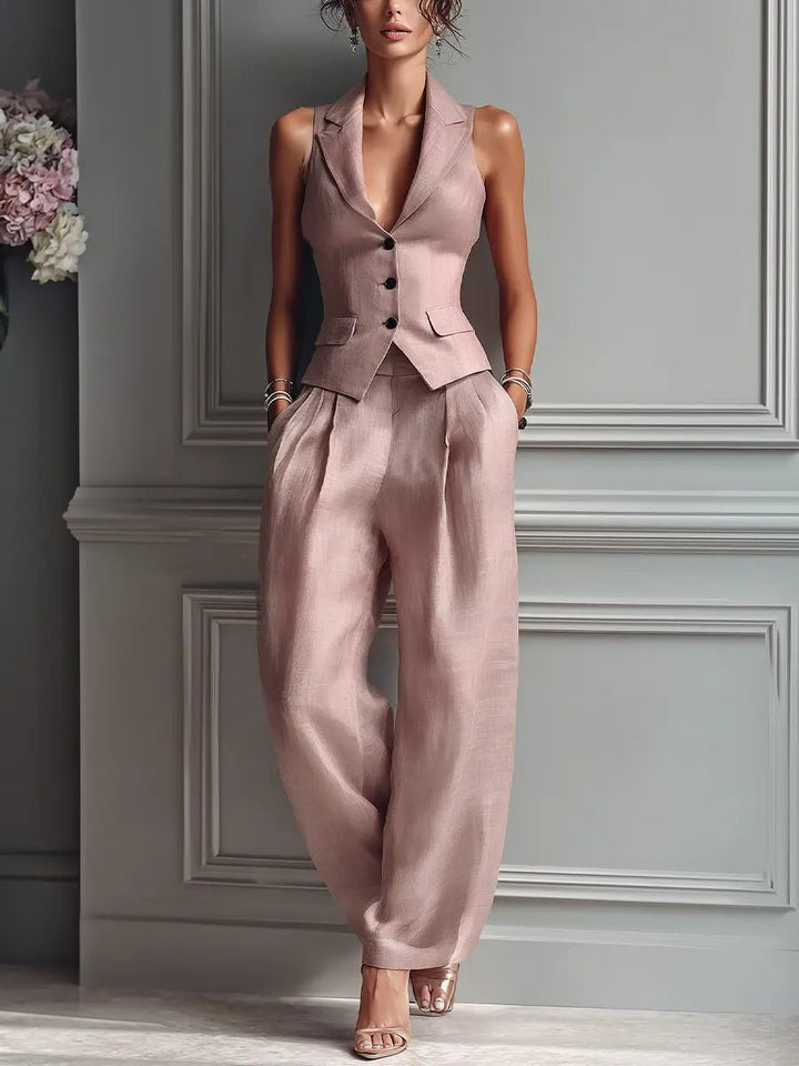 Sophisticated women's blush pink vest and wide-leg pants two-piece set. Ideal for business casual or formal events.