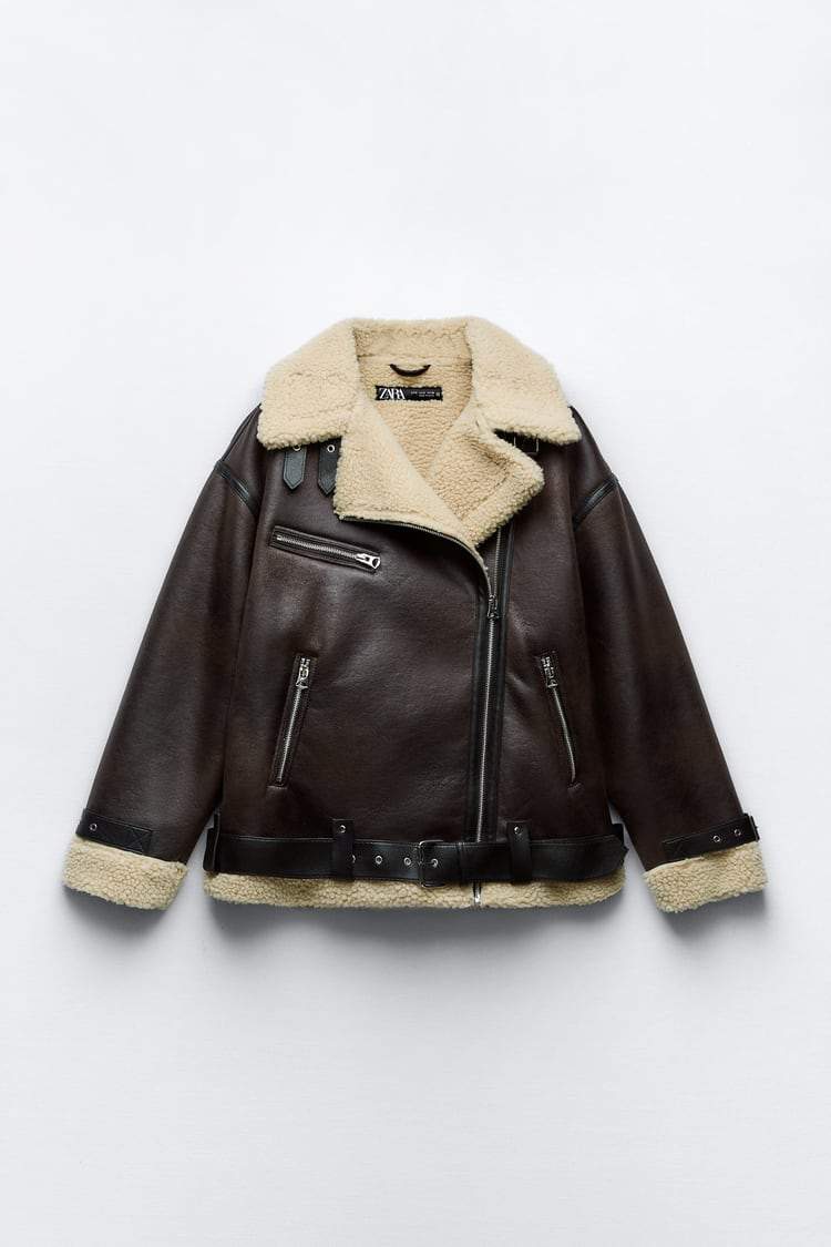 Fashionable women's brown lapel jacket. Cozy and elegant outerwear, great for fall, winter, and casual style.