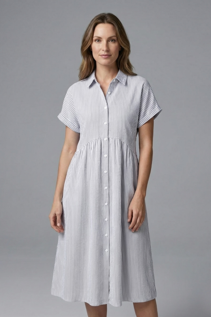 Button-front collared midi dress for women, showcasing elegant design & flattering fit for any occasion.