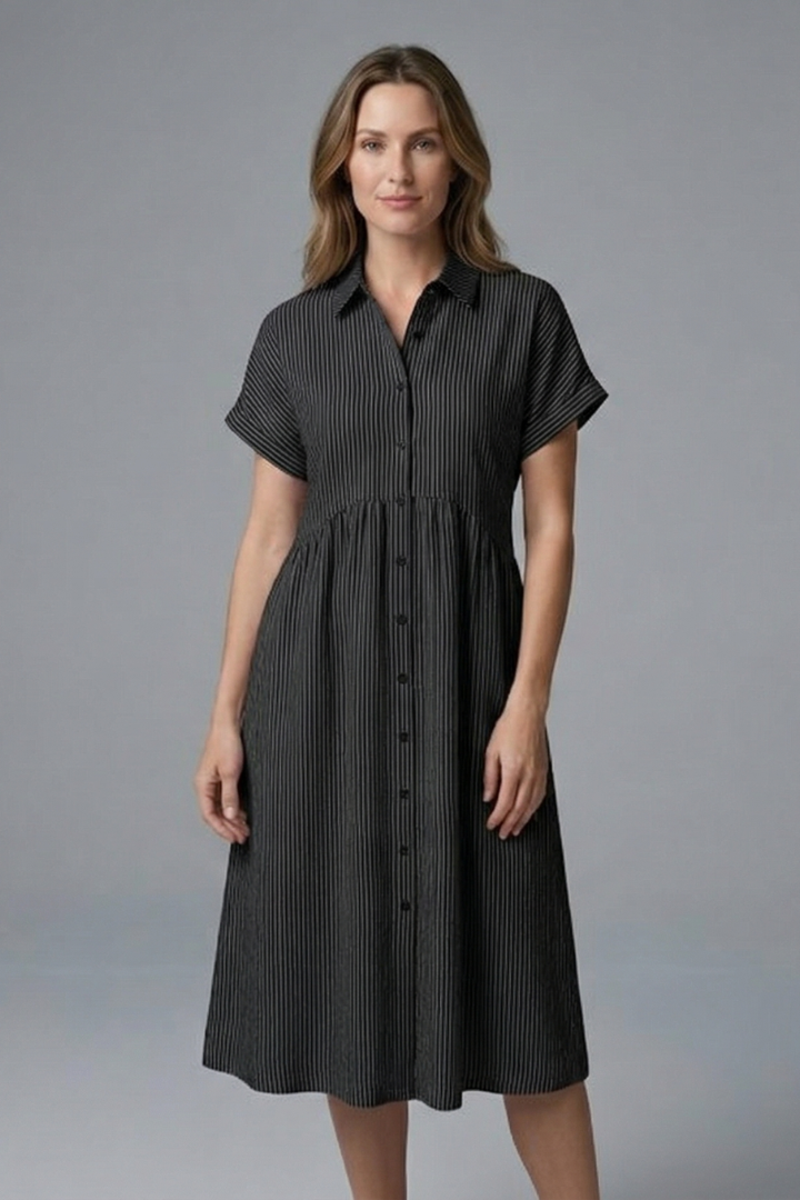 Stylish women's midi dress, collared & button-front, offering elegant office & relaxed summer wear.