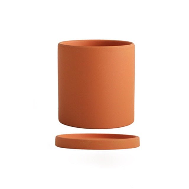 Durable ceramic flowerpot with saucer for indoor plants, featuring a smooth matte finish.