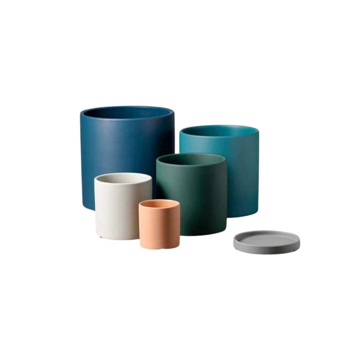 Beautiful ceramic flowerpot with saucer, a timeless home accent for indoor greenery.