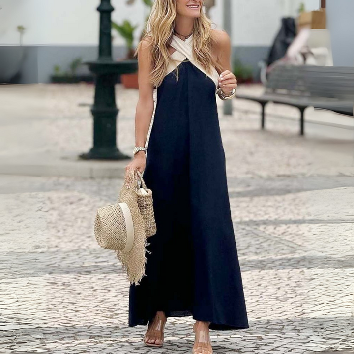 Elegant women's cross-neck summer dress. A-line cut, chic & comfortable for casual or vacation style.
