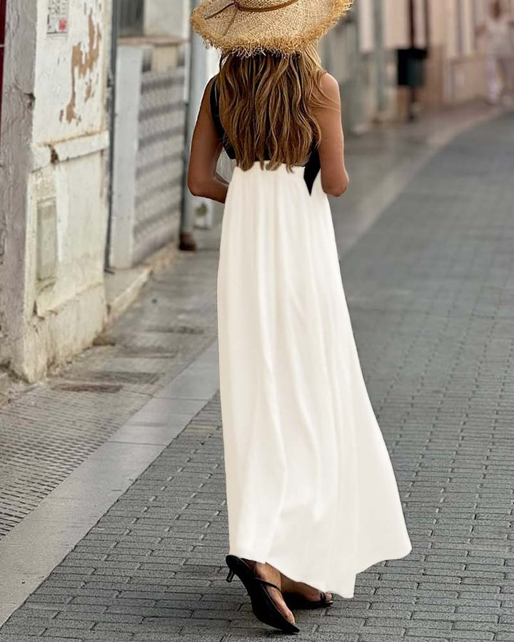 Versatile elegant cross-neck women's summer dress. A-line, perfect for casual outings or vacation wear.