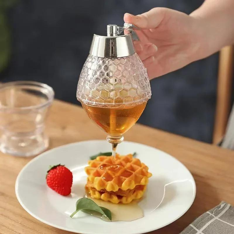 Clear plastic drip-free honey dispenser. Ideal kitchen & dining tool for serving syrups, sweeteners, and breakfast.