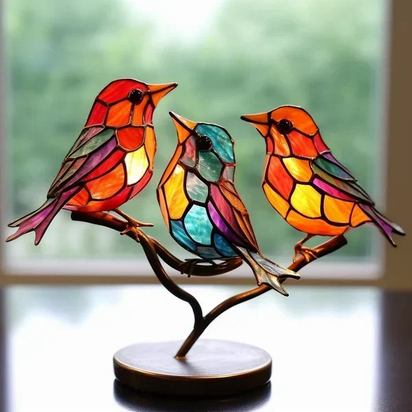 Handcrafted colored glass bird sculpture, ideal elegant home decor for shelves or desks.