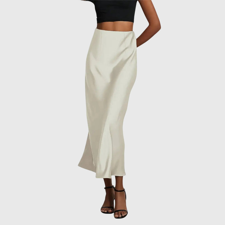 Elegant cream high waist maxi skirt with a flattering bias cut, perfect for versatile fashion.