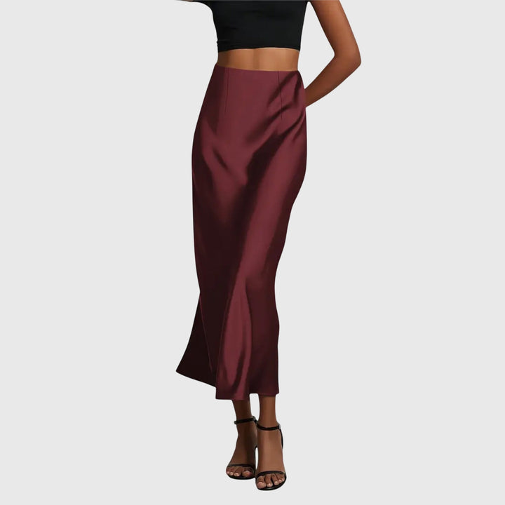Cream high waist women's maxi skirt, showcasing its elegant bias cut and flowing long design.
