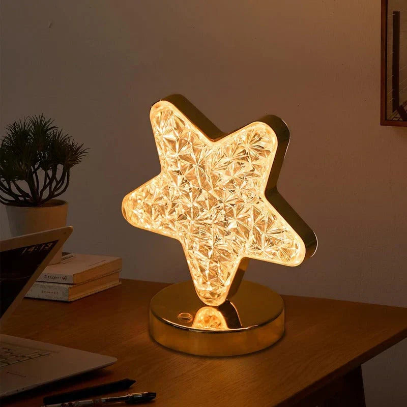 Modern crystal dimmable table light for sophisticated home decor. LED elegant lamp for ambient bedroom or living room lighting.