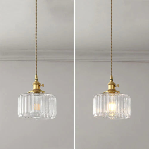 Ornate crystal pendant light, elegant vintage design, glass hanging lamp for ambient home lighting.