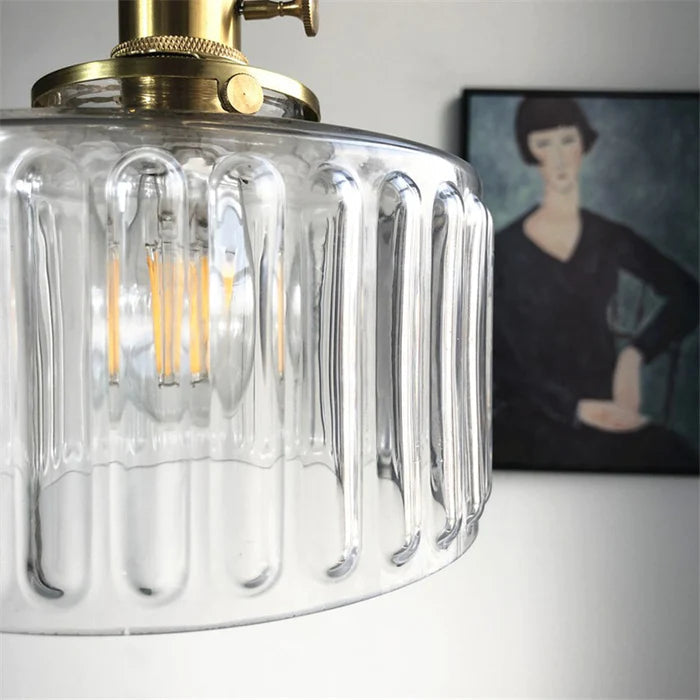 Warm glow crystal pendant lamp, elegant vintage lighting, ambient glass fixture for dining.