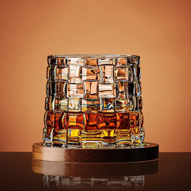 Elegant crystal whiskey glass set with premium wooden base, perfect for bourbon and scotch enthusiasts. A refined barware gift.