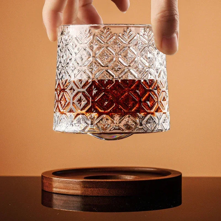 Luxury crystal whiskey glasses arranged on their wooden base, enhancing any home bar. An elegant and unique gift set.