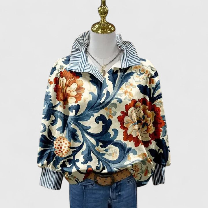 Elegant dark blue women's blouse with delicate 3D floral details, perfect for chic casual or evening wear.
