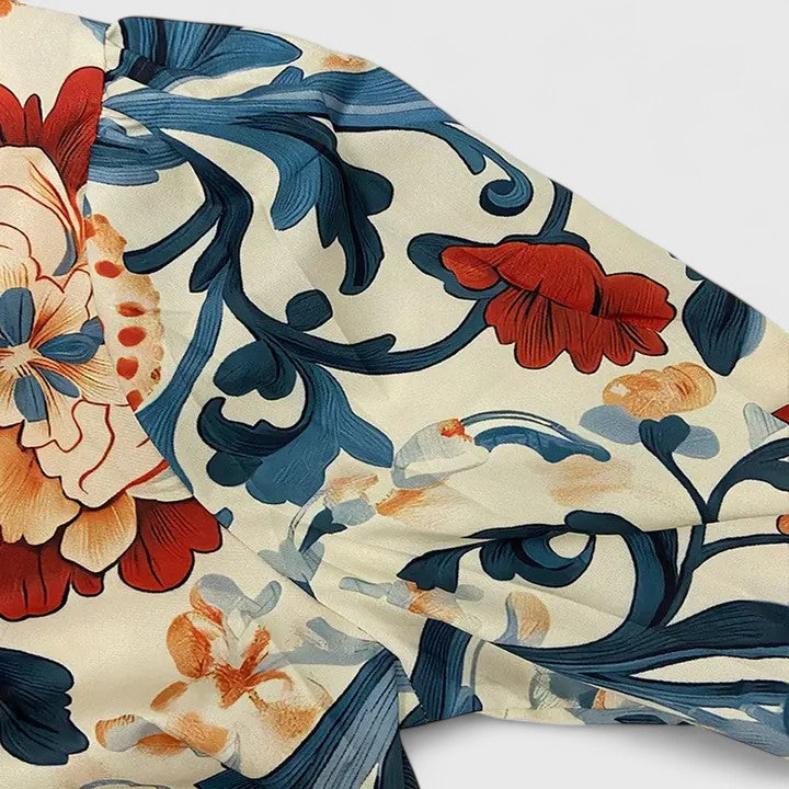 Stylish dark blue long-sleeve women's blouse featuring beautiful 3D floral embellishments for versatile wear.