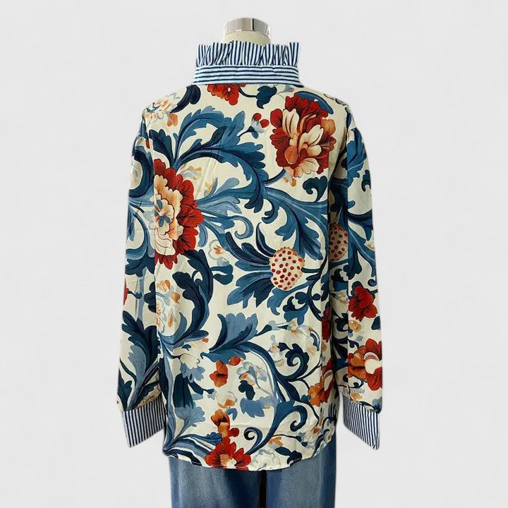 Versatile dark blue women's top with elegant long sleeves and intricate 3D floral details.