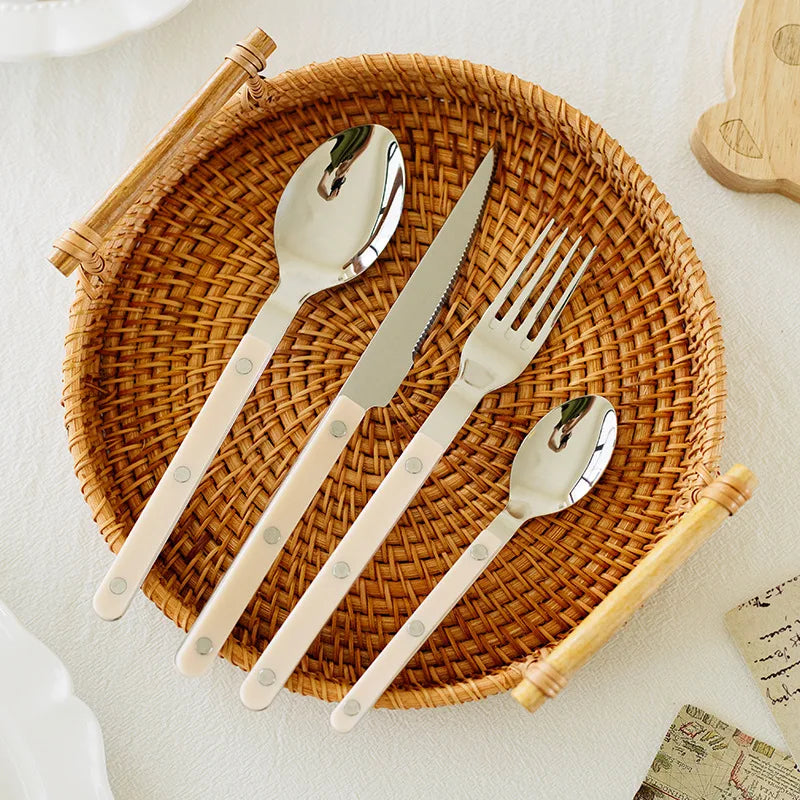Premium engraved stainless steel cutlery, a complete 24-pc dining set.
