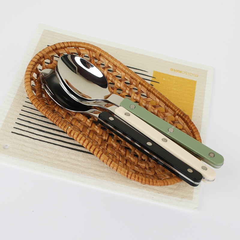 Durable stainless steel cutlery set, 24 pieces with an elegant engraved design.