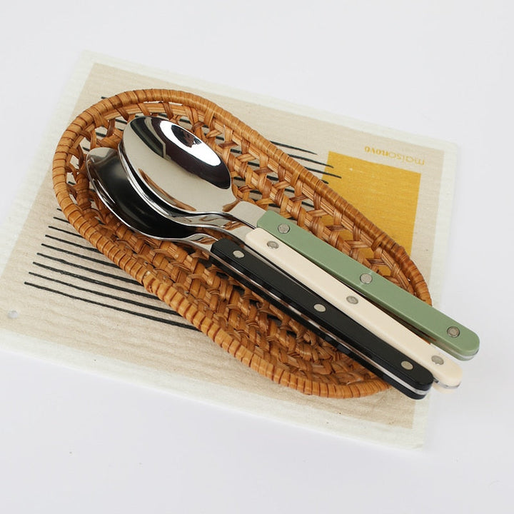 Durable stainless steel cutlery set, 24 pieces with an elegant engraved design.