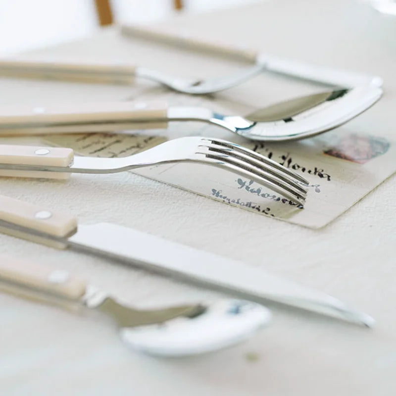 Sophisticated 24-piece engraved stainless steel kitchen utensils for entertaining.