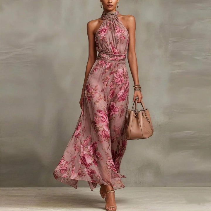 Elegant floral maxi dress with halter neck, perfect for wedding guests or formal summer parties.