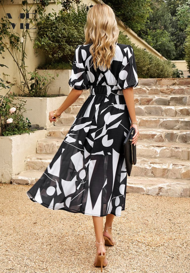 Summer vacation dress: women's floral midi with puff sleeves, V-neck, and flowing A-line skirt.