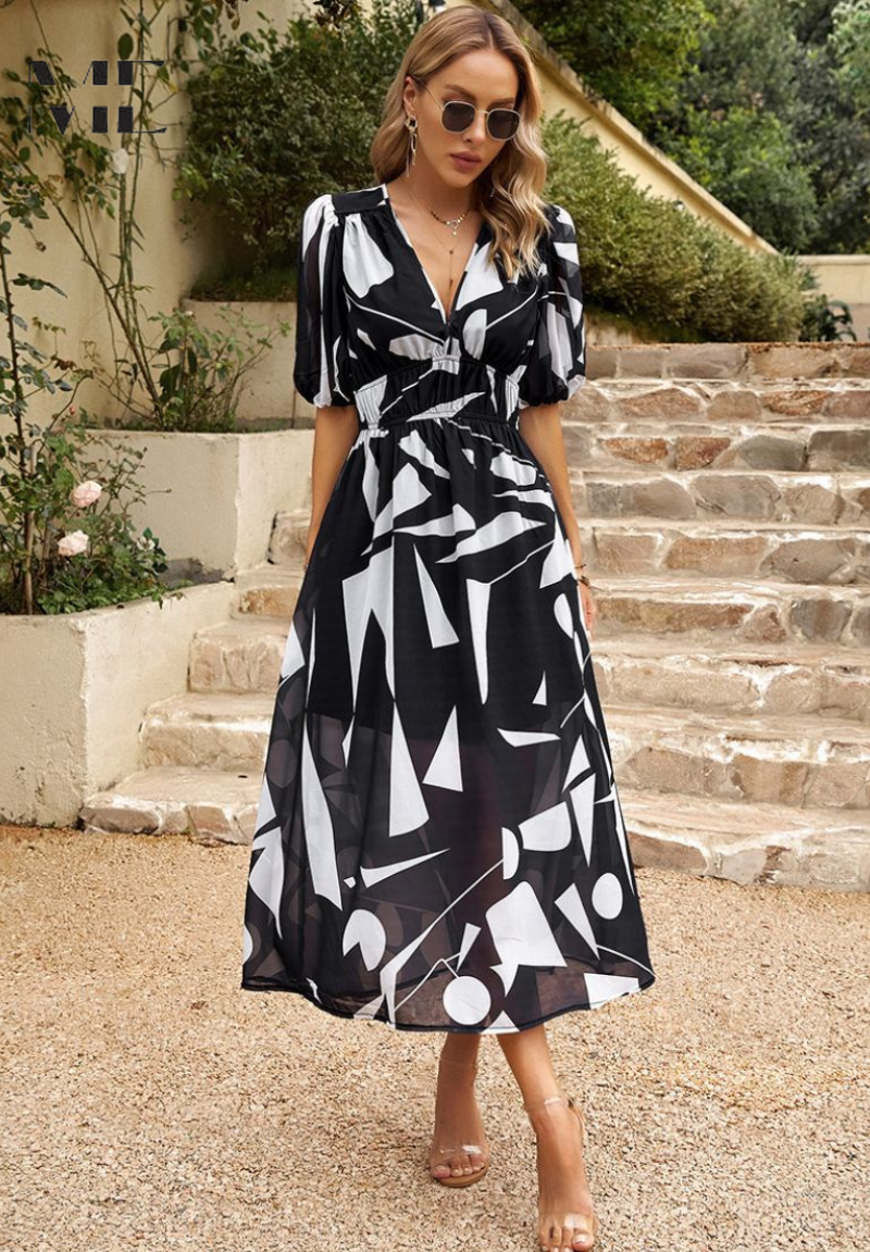 Vibrant floral puff sleeve midi dress for women, ideal for a summer party or elegant casual wear.