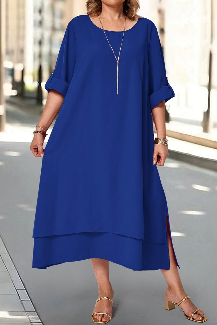 Women's elegant maxi dress, flowing design with delicate details for evening.