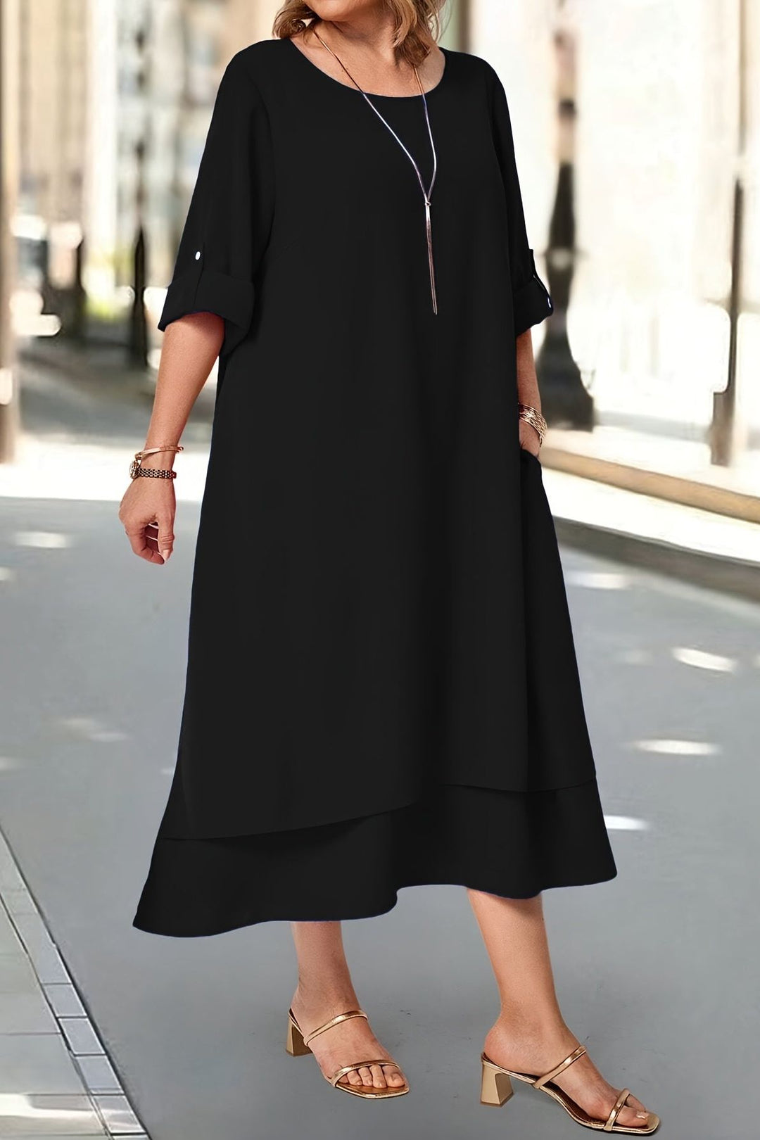 Stylish women's long dress, elegant black maxi for formal special occasions.
