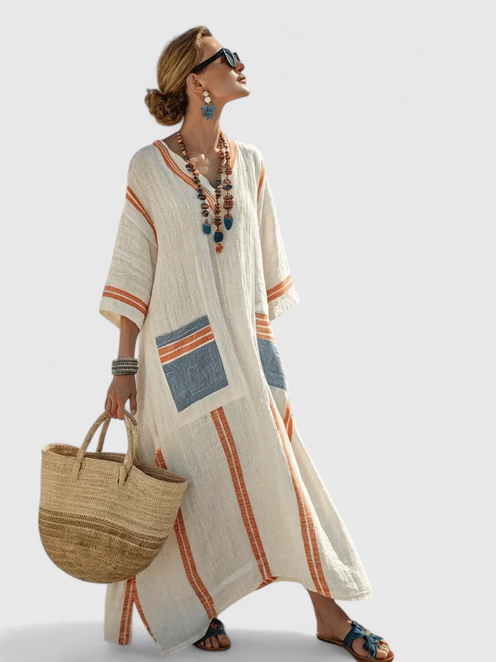 Women's elegant flowy long dress, ideal for summer evenings or casual spring wear. Comfortable & chic maxi dress.