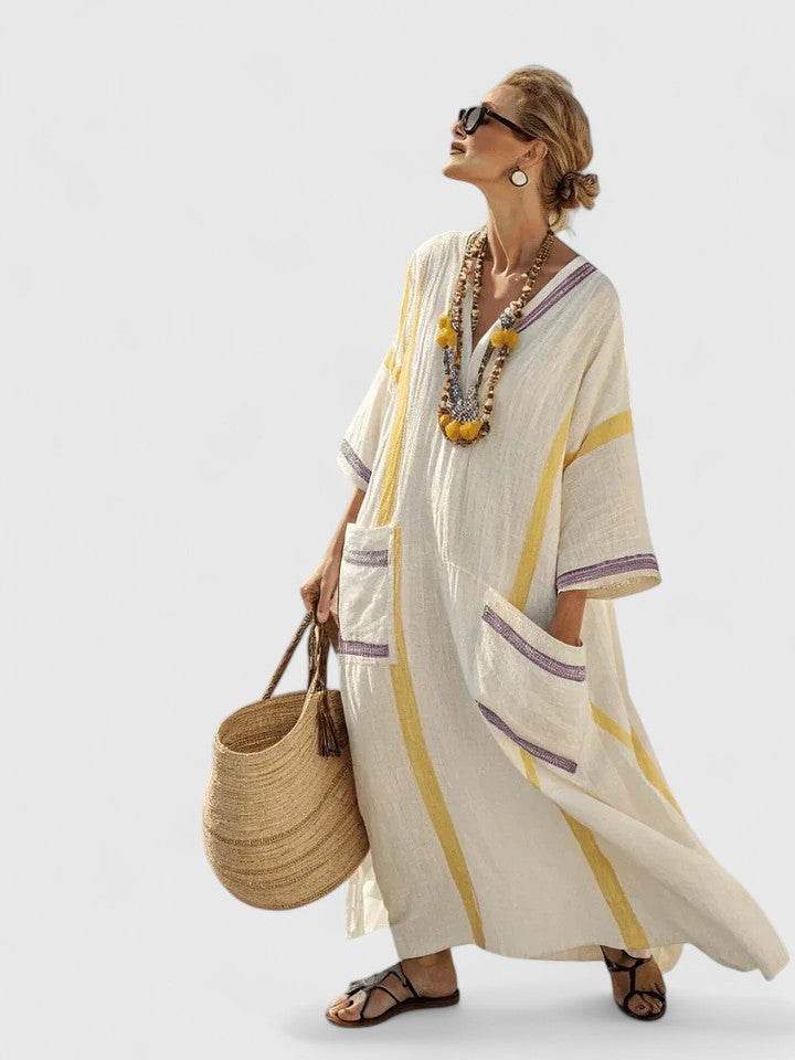 Modest fashion women's flowy maxi dress, an elegant long dress for comfortable everyday style or special events.